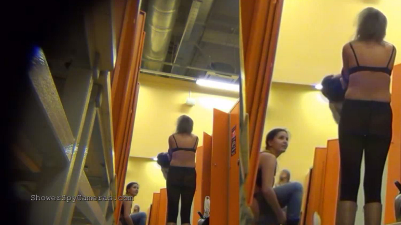 Few women caught on a hidden camera undressing in a locker room